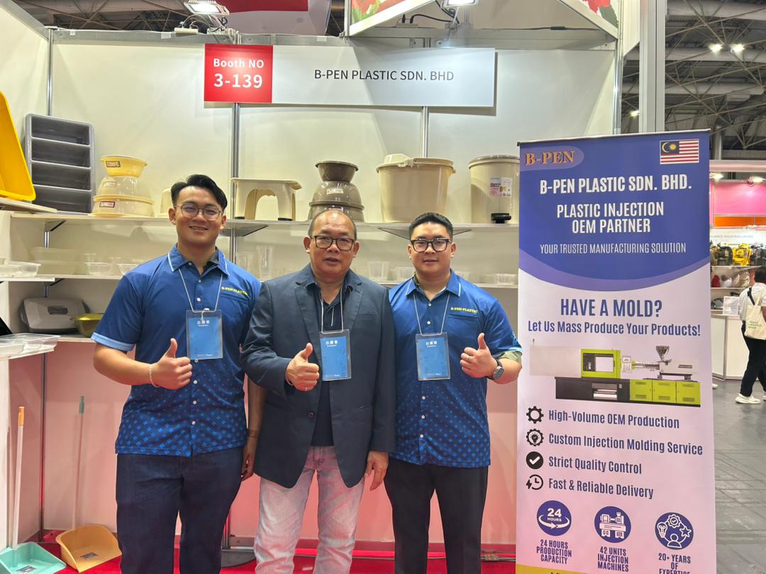 B-PEN Plastic team at booth 3-139 with the plastic injection OEM partner banner